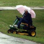 mowing in the rain